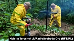Ukrainian researchers search in a forest in southeastern Poland for the remains of Ukrainian Insurgent Army fighters believed killed in the area in 1947. 