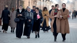 Women walk through a street in the Chechen capital, Grozny. In the past month, the republic's authorities have issued several new restrictions on women's clothing. 